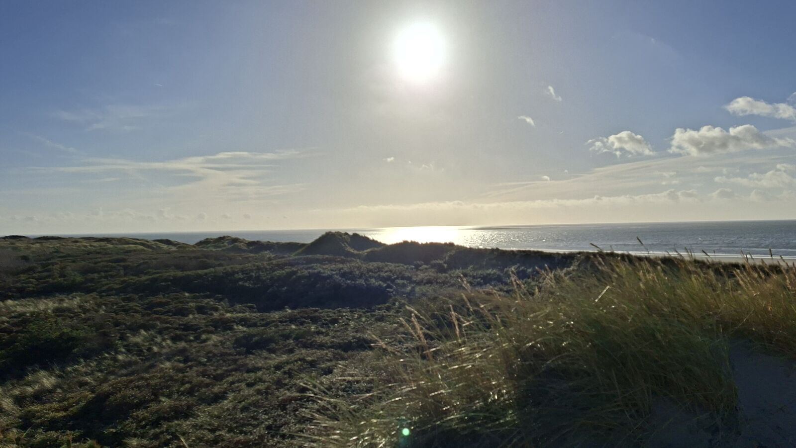 Avondlicht over de duinen bij Hollum