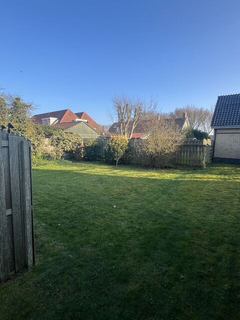 De omheinde tuin